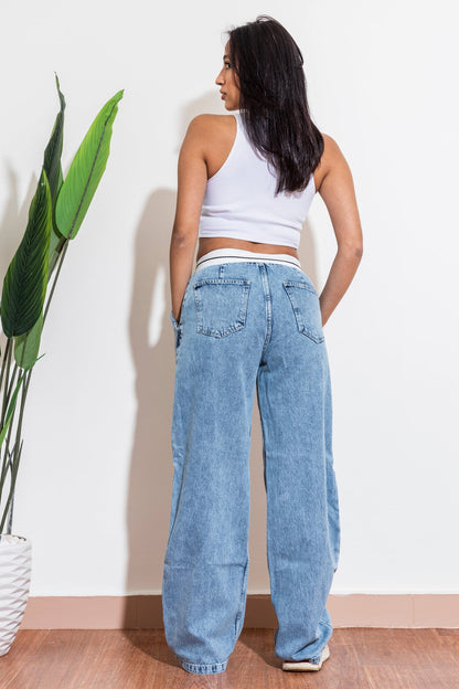 reversed waistband blue jeans