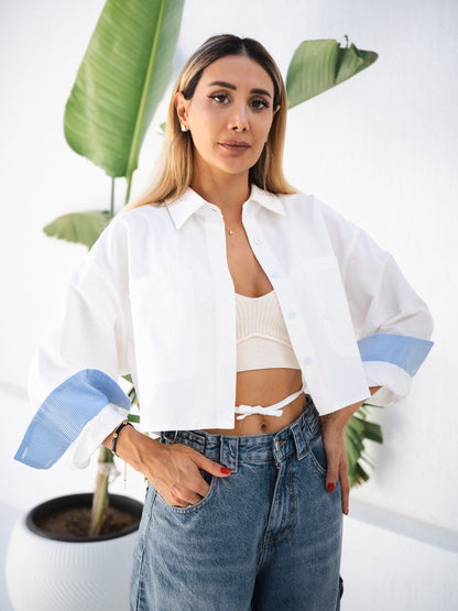 Style: Cropped poplin shirt with front pocket